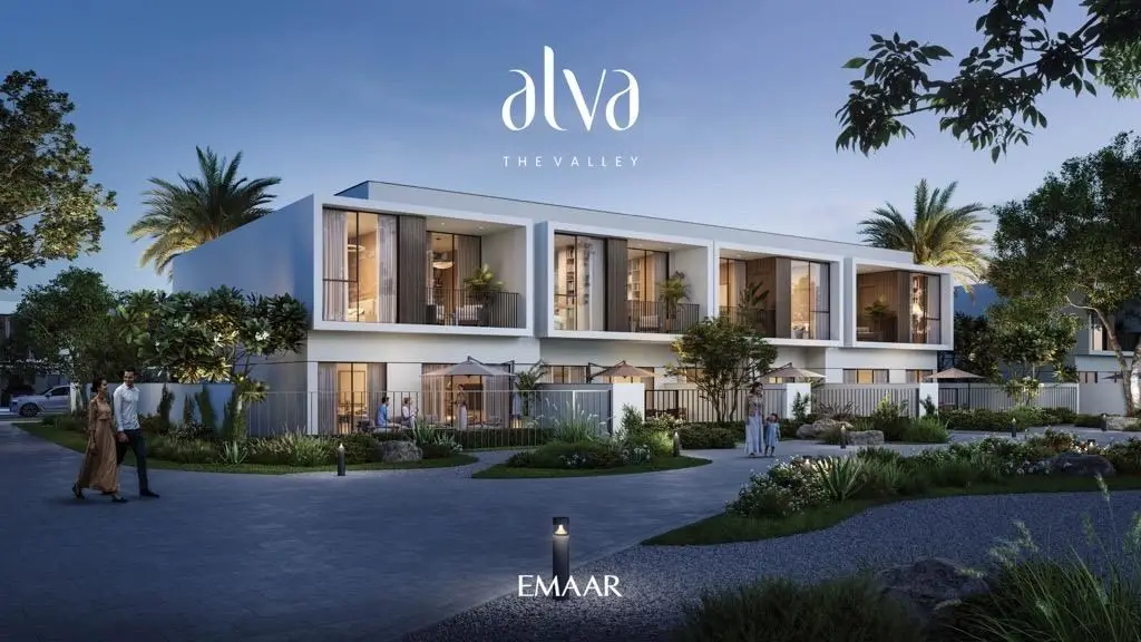 Evening elevation: townhouse row with lit interiors and planted gardens